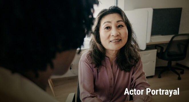 Older woman smiling. Actor portrayal